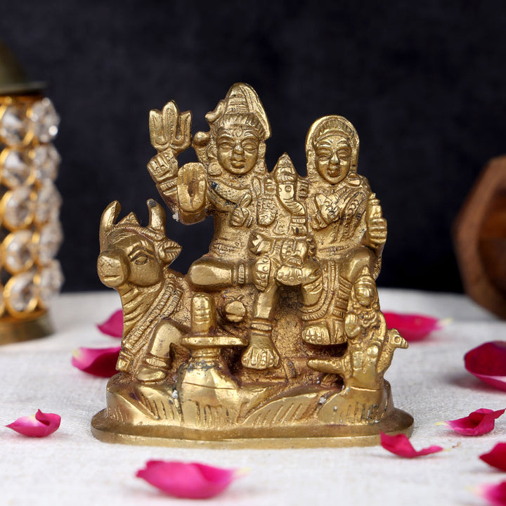 4.3 inch divine Shiva family brass idol featuring Lord Shiva, Parvati, Ganesha, and Kartikeya for home temple and spiritual worship. No.1 Brass Idol Store www.satvikworld.com
