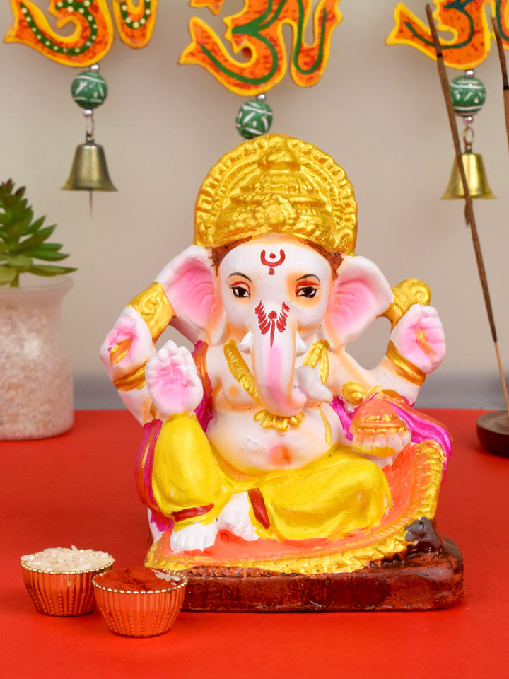 6-inch vibrant eco-friendly Ganesha idol in Padmasana pose, made from natural clay and hand-painted with bright, non-toxic colors for home worship. India’s Largest Pooja Accessories Brand – www.satvikstore.in