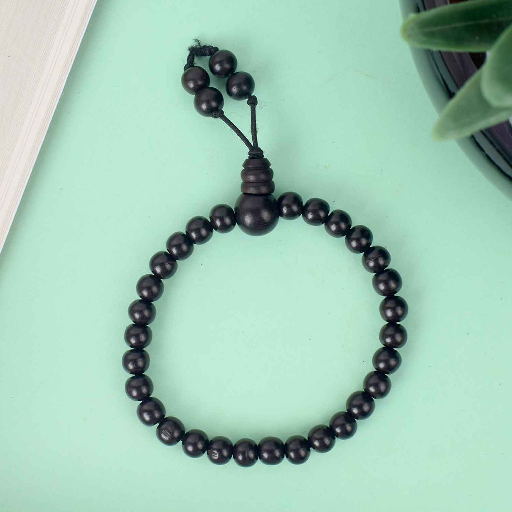 6mm Ebony Bracelet with Gloss Finish – sleek and polished black wooden bead bracelet for spiritual balance and style. India’s Largest Pooja Accessories Brand - www.satvikstore.in 