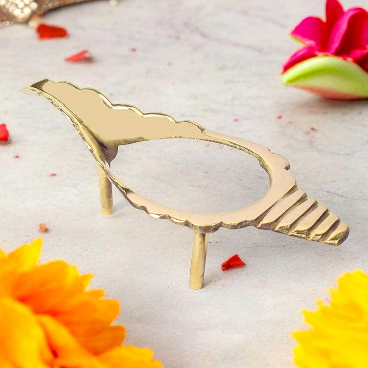 8 inch finely crafted brass Shankh stand with a sturdy base and traditional design, perfect for securely holding sacred conch shells in temples or home mandirs. India’s Largest Pooja Accessories Brand – www.satvikstore.in