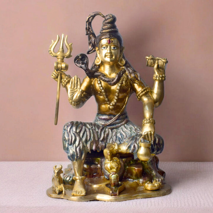 Large Brass Idol of 18.5 Inch Handcrafted Brass Statue of Lord Shiva. Bring divine energy and serenity into your space with this stunning 18.5-inch Brass Statue of Lord Shiva. Expertly crafted from high-quality brass, this statue beautifully depicts Lord Shiva in a powerful yet peaceful stance, symbolizing both strength and tranquility.