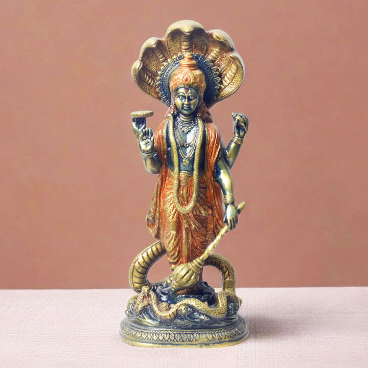   Large Brass Idol of 17 Inch Brass Vishnu Standing with Sheshanag. Bring divine protection and blessings into your home with this stunning 17-inch Brass Vishnu Standing with Sheshanag Idol. This intricately crafted statue features Lord Vishnu, the preserver of the universe, standing gracefully atop the Sheshanag (cosmic serpent). on www.satvikstore.in