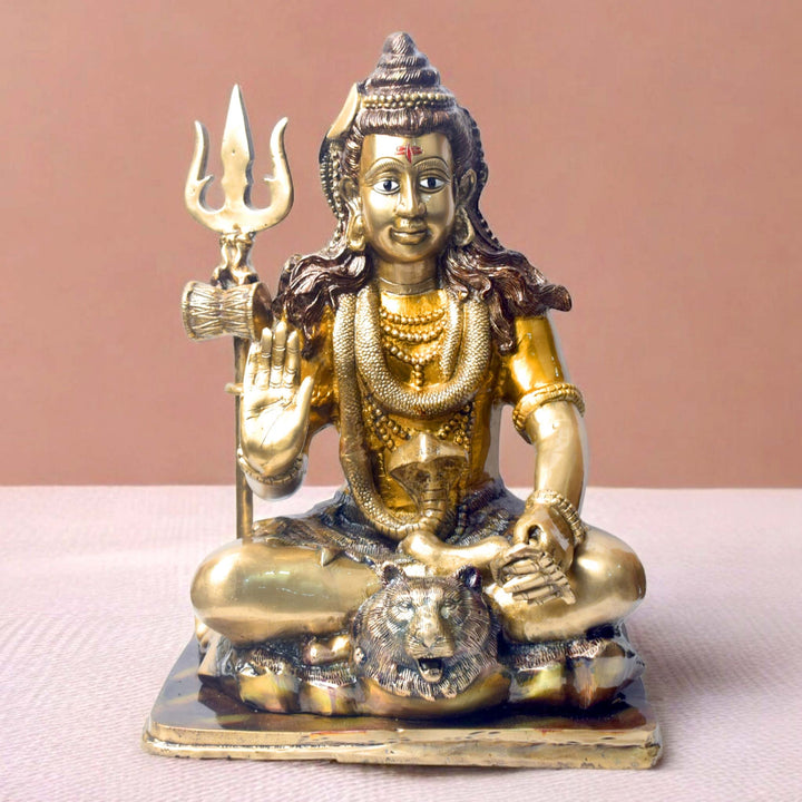 Large Brass Idol of 17.5 Inch Brass Lord Shiva Statue in Meditation Pose. Embodying peace and spiritual focus, this 17.5-inch Brass Shiva Idol features Lord Shiva in a serene meditative posture. Known as the ultimate yogi, Lord Shiva is beautifully represented here with intricate detailing in brass, capturing the tranquility and profound wisdom of his meditation on www.satvikstore.in