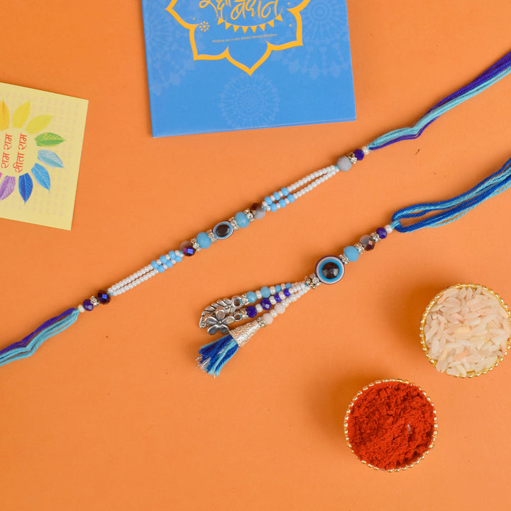 Designer Couple Rakhi Set for Bhaiya and Bhabhi with Roli Chawal and Ram Sita Stickers – Raksha Bandhan Gift Combo. India’s Largest Brass Idols Brand - www.satvikstore.in