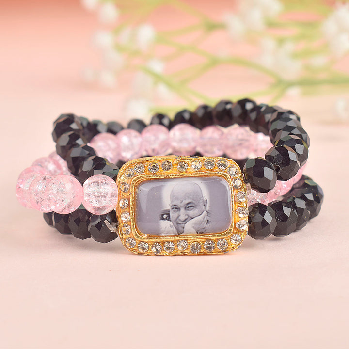 Black & Pink Triple Layer Guruji Swaroop Bracelet featuring sleek black beads with a vibrant pink middle layer and Jai Guruji Swaroop – perfect for spiritual wear, meditation, and gifting. India’s Largest Pooja Accessories Brand – www.satvikstore.in