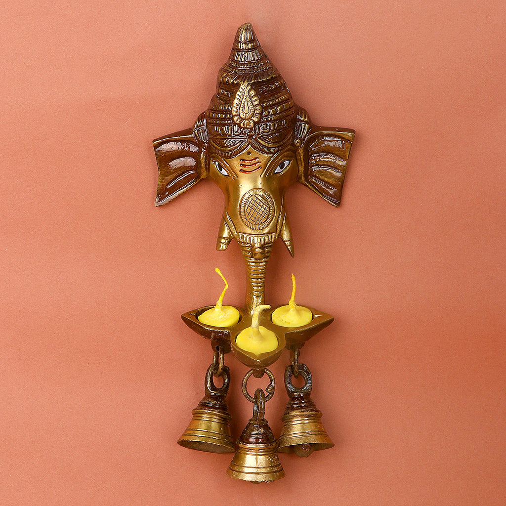 8.8 Inch Brass Ganesh Wall Hanging with attached bell and diya – beautifully handcrafted, ideal for spiritual wall décor, entrance positivity, and festive ambiance. No.1 Brass Idol Store www.satvikstore.in 