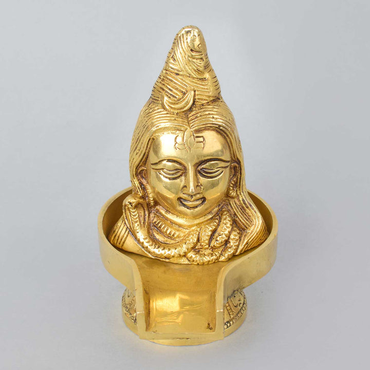 5.2 Inch Brass Lord Shiva Mukhalingam Shivling featuring intricate design and divine presence, perfect for pooja rituals, home mandir, and spiritual décor. No.1 Brass Idol Store www.satvikstore.in 