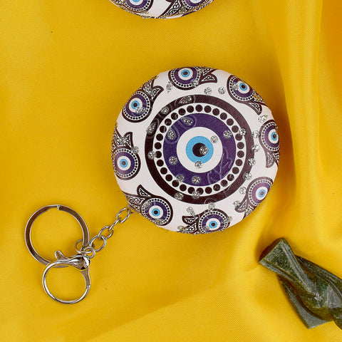 Cute Round Evil Eye Keychain with Foldable Mirror, a stylish accessory that combines protection, good luck, and convenience. India’s Largest Pooja Accessories Brand – www.satvikstore.in