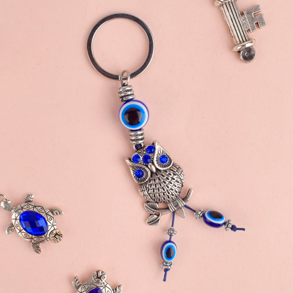 Elegant Blue Evil Eye Keychain, a protective charm and stylish accessory perfect for gifts, home, bag, or car. India’s Largest Pooja Accessories Brand – www.satvikstore.in