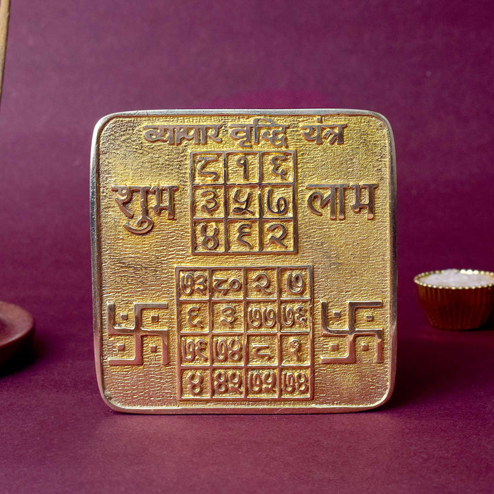 Energized Asht Dhatu Vyapar Yantra for business success, engraved with divine symbols to attract financial prosperity, growth, and protection in commercial ventures. India’s Largest Pooja Accessories Brand - www.satvikstore.in
