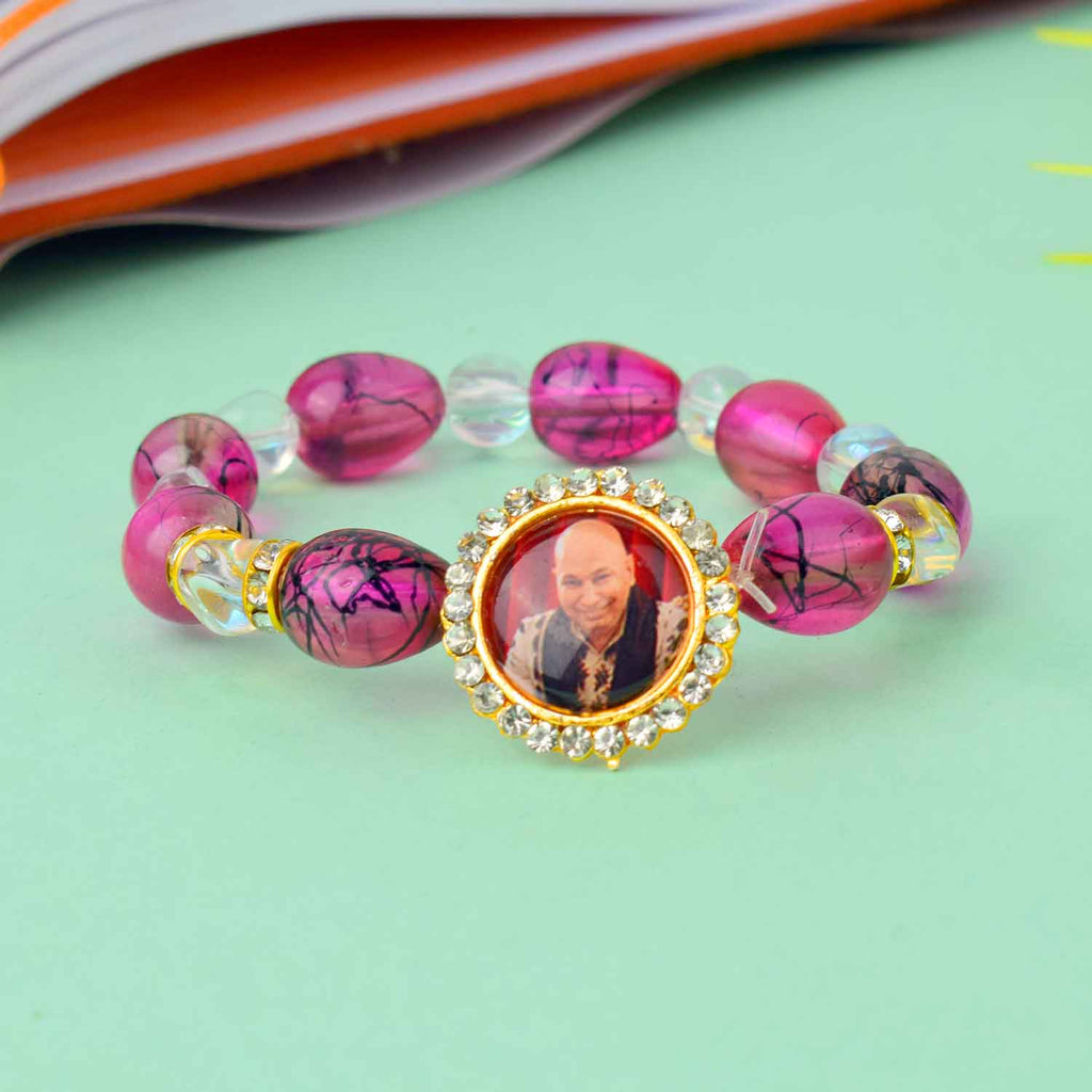 Guruji Swaroop Bracelet with coloured beads in clear, blue, green, and pink – ideal for daily wear and spiritual occasions. India’s Largest Pooja Accessories Brand – www.satvikstore.in