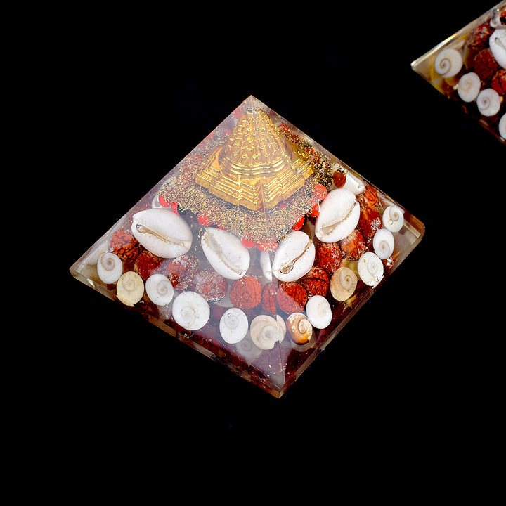 Large Orgonite Shri Yantra Gomti Chakra Pyramid, designed for spiritual growth and prosperity, combines sacred geometry and healing energy to cleanse and harmonize your space. India’s Largest Pooja Accessories Brand – www.satvikstore.in