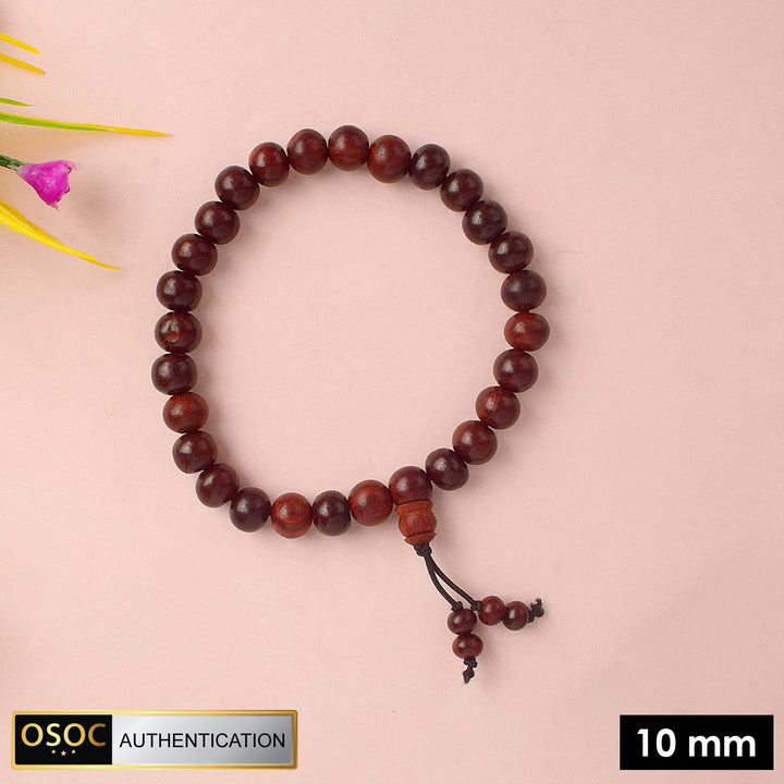 Beautiful handcrafted Red Chandan Bracelet made from pure red sandalwood beads, designed for enhancing spiritual balance, inner strength, and daily protection during meditation and pooja. India’s Largest Pooja Accessories Brand - www.satvikstore.in