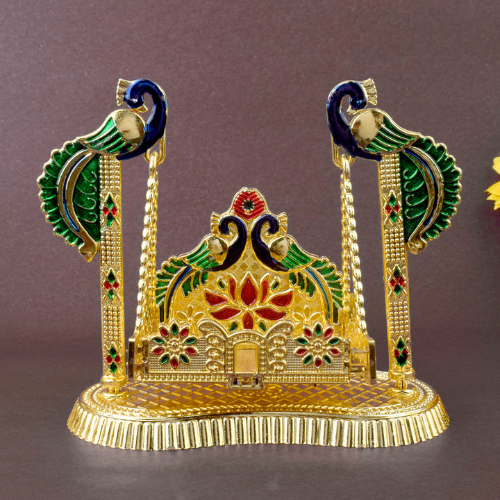 Peacock-themed graceful Laddu Gopal Jhula with intricate design, ideal for Bal Gopal idol placement during pooja or Janmashtami festivities. India’s Largest Pooja Accessories Brand – www.satvikstore.in








