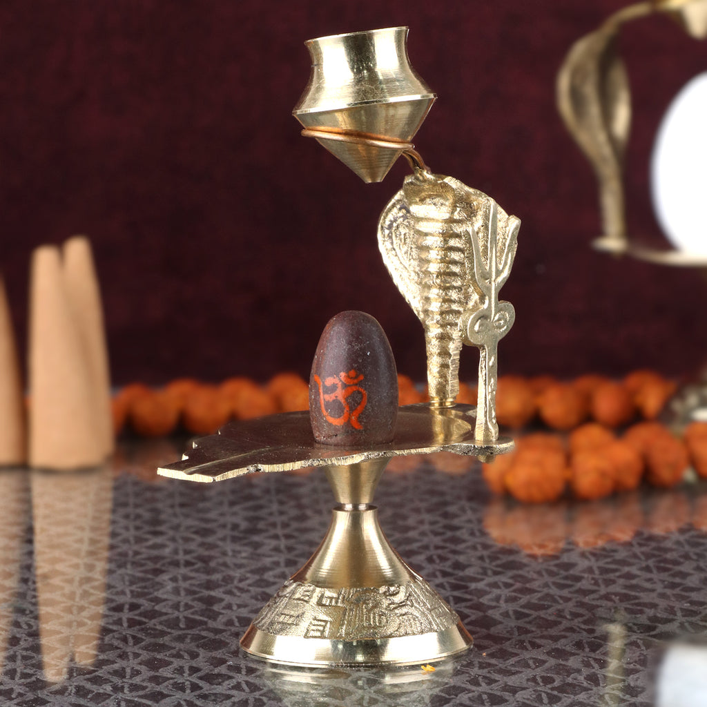 Pure Brass Divine Small Narmadeshwar Shivling, a beautifully crafted small-sized Shivling made from pure brass, symbolizing Lord Shiva and perfect for worship and spiritual rituals. 
India’s Largest Pooja Accessories Brand – www.satvikstore.in 