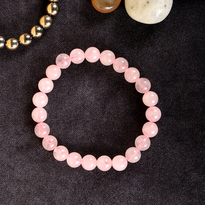 Rose quartz and golden pyrite healing stone bracelet with pink and metallic gold 8mm beads. India’s Largest Pooja Accessories Brand - www.satvikstore.in
