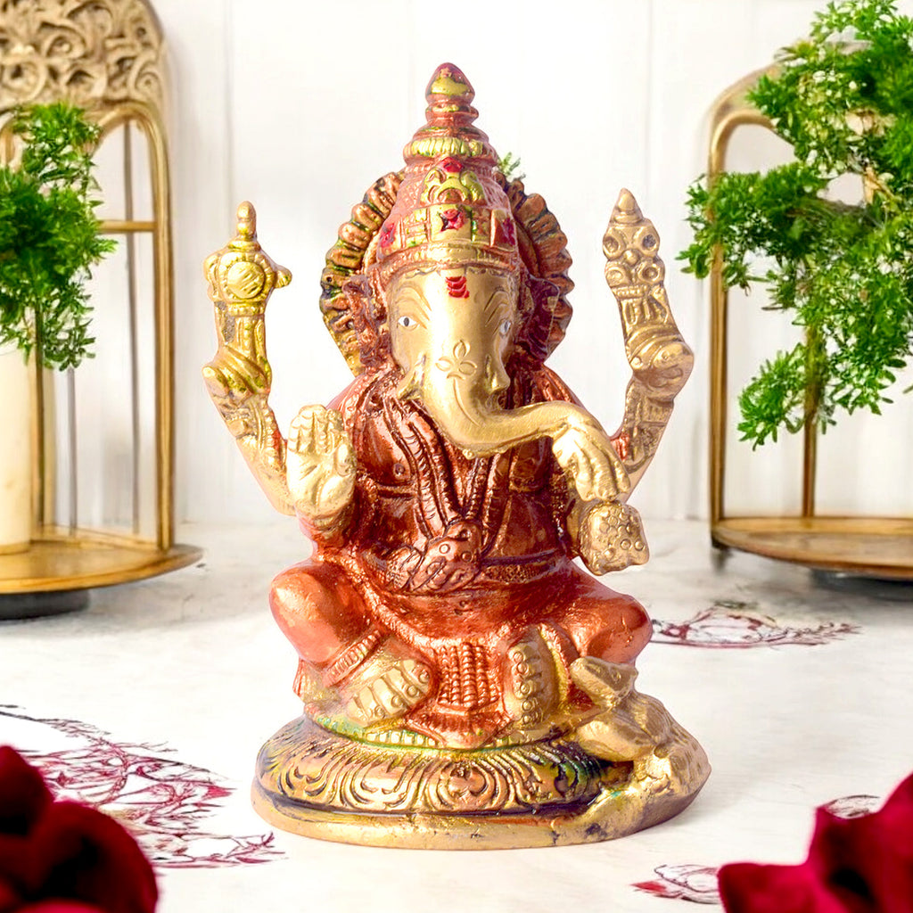 4.5 Inch Vibrant Colored Brass Ganesh Statue with detailed craftsmanship and rich colors ideal for home temple or festive décor. No.1 Brass Idol Store www.satvikstore.in 