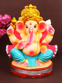 Beautifully sculpted 8-inch Vikat Ganesha idol in Padmasana pose, crafted from eco-friendly clay and adorned with serene, festive detailing. India’s Largest Pooja Accessories Brand – www.satvikstore.in