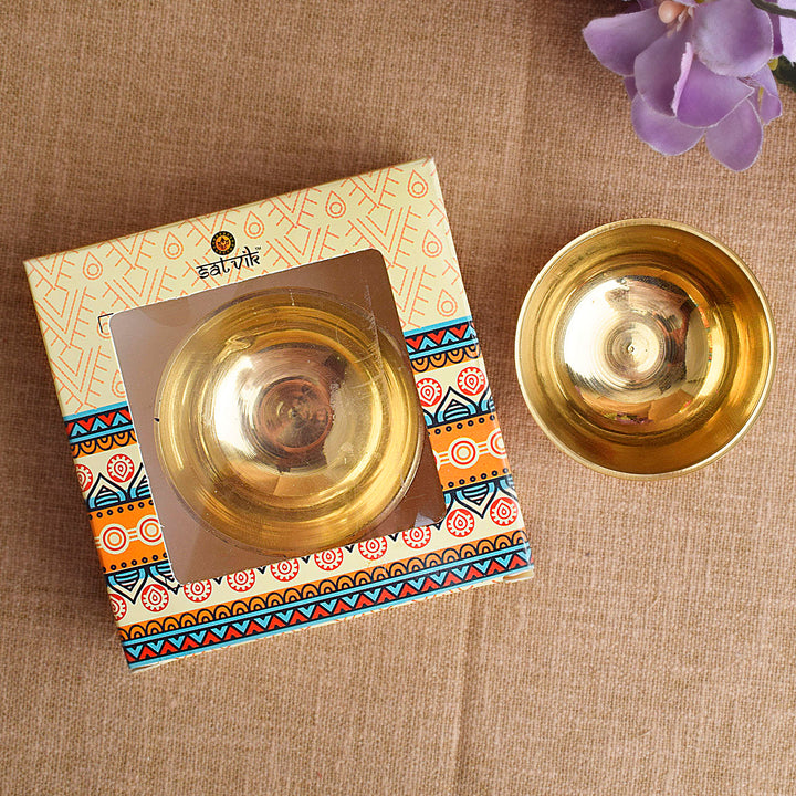 Brass Bhog Bowl (Small) is a traditional offering bowl used for presenting prasad during religious rituals and poojas. Crafted from high-quality brass, it ensures purity and sanctity in your spiritual practices – India’s Largest Pooja Accessories Brand – www.satvikstore.in