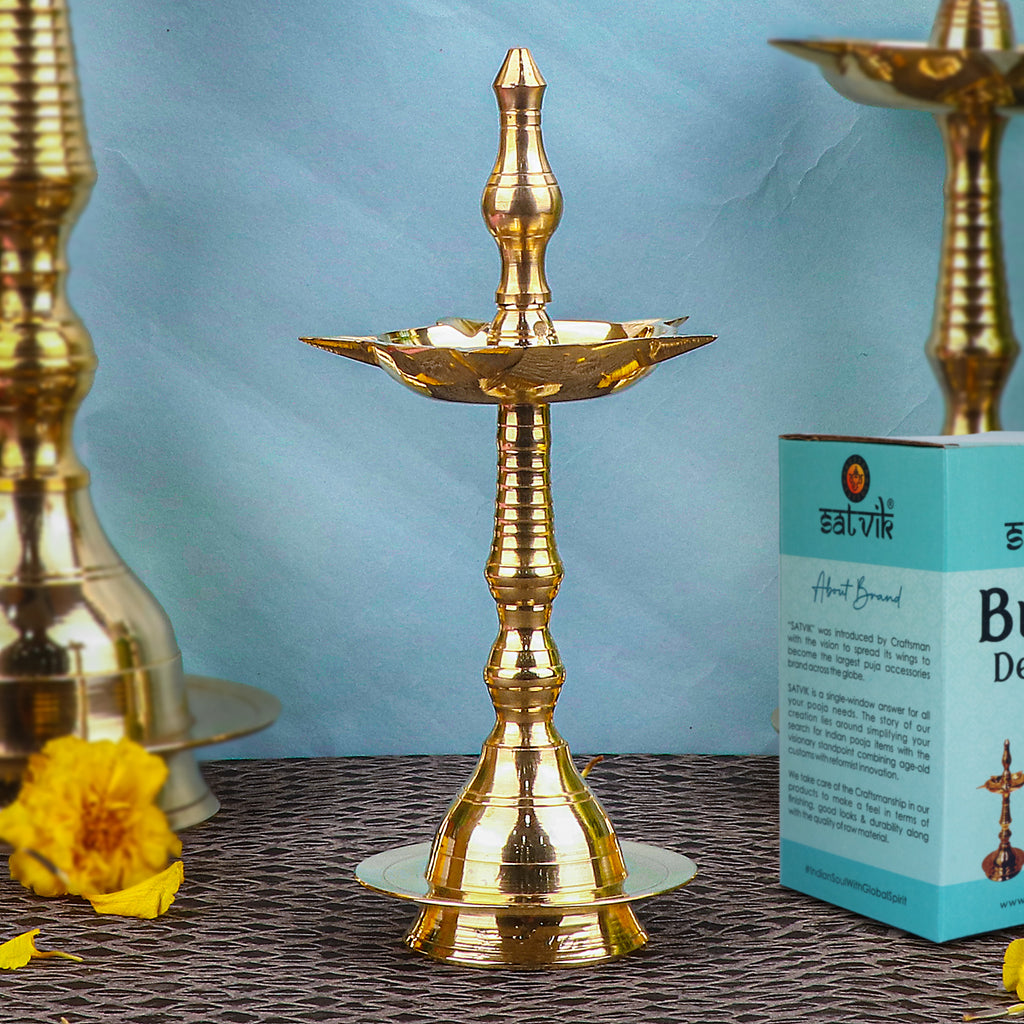 12 Inch Beautiful Brass Kerala Inauguration Diya – Handcrafted brass diya perfect for inaugurations, pooja ceremonies, and traditional décor, radiating warmth and positivity. India’s Largest Pooja Accessories Brand – www.satvikstore.in