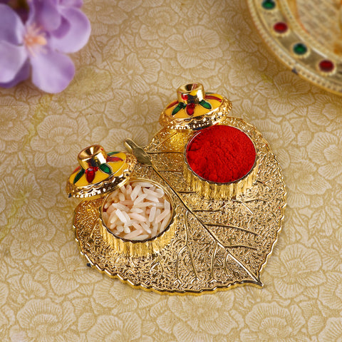 Beautiful Roli Akshat Small Pan Leaf Platter, crafted in a charming paan leaf shape, ideal for holding roli and akshat during pooja and tilak rituals. 
India’s Largest Pooja Accessories Brand – www.satvikstore.in 