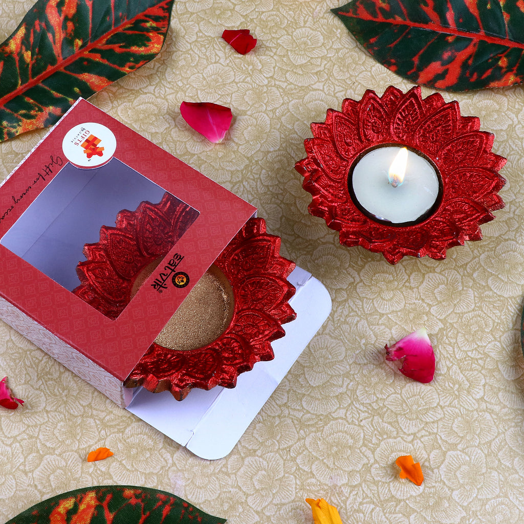 Pair of Floral Chakra Metal Diyas in vibrant red color, beautifully crafted with intricate petal design, ideal for Diwali, pooja rituals, and festive home decor. India’s Largest Pooja Accessories Brand – www.satvikstore.in